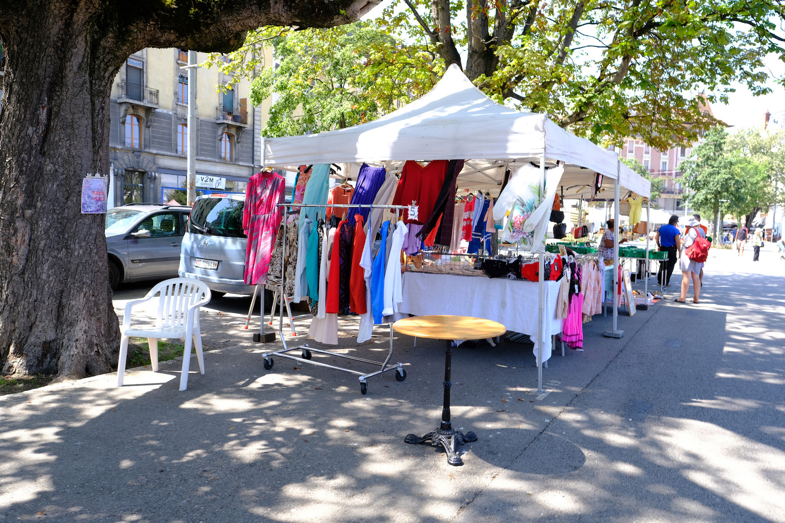 flea market flip in the city, antiques, old furniture, tables, used things, clothes and other goods are sold on the street, recycling of unwanted items, pollution of nature